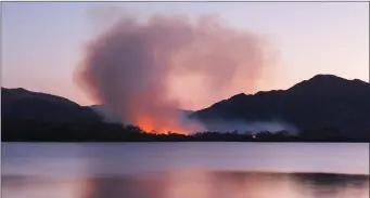  ?? Photo by Peter O’Toole ?? A gorse fire raged over the Killarney Lakes on Sunday, one of many across the county at the weekend, stretching emergency services at a time of national crisis due to COVID-19.