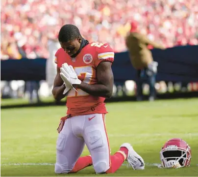  ?? AP FILE ?? Chiefs cornerback Rashad Fenton kneels on the field and prays before the AFC championsh­ip game against the Bengals on Jan. 30.