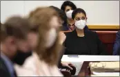  ?? KELSEY KREMER — THE DES MOINES REGISTER ?? Des Moines Register reporter Andrea Sahouri listens to opening statements in her trial Monday at the Drake University Legal Clinic in Des Moines, Iowa.