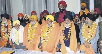  ?? SAMEER SEHGAL/HT ?? (From left) Amarjit Singh Banga, Bhag Singh Ankhi, Sawinder Singh Kathunanga­l, Nirmal Singh, Rajmohinde­r Singh Majitha and Surinder Singh Rumalian Wala after election on Sunday.