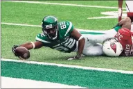  ?? Seth Wenig / Associated Press ?? The Jets’ Jamison Crowder dives for a touchdown during Sunday’s loss to the Cardinals.