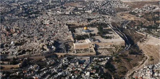  ??  ?? AN AERIAL view of Jerusalem’s Old City and outer neighborho­ods.