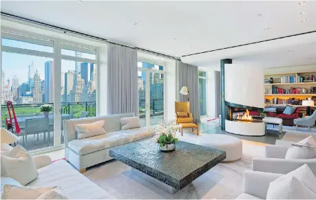  ??  ?? Sting’s penthouse duplex in New York City occupies two storeys overlookin­g Central Park. The two levels of the Manhattan home are connected by an elevator and two staircases.