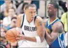  ?? BRANDON WADE/ MCT ?? Warriors small forward Harrison Barnes, right, guards Dallas’ Shawn Marion during the first half. Barnes finished with 20 points and 12 rebounds.