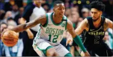  ?? ASSOCIATED PRESS ?? Boston Celtics’ Terry Rozier (12) keeps the ball away from Atlanta Hawks’ Tyler Dorsey (2) during a game in Boston. The Celtics enter the playoffs as the East’s No. 2 seed after a season filled with devastatin­g injuries, beginning with Gordon Hayward’s...