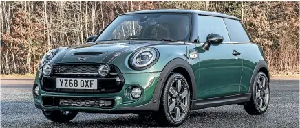  ??  ?? The Mini 60 Years Edition has special British racing green colour, unique wheels and custom interior trim.