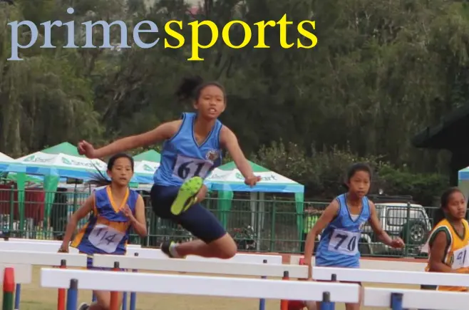  ?? Photo by Roderick Osis ?? OBSTACLE. A Baguio athletes hurdles her obstacle during the CARAA sports meet in February this year. Baguio – and Benguet is eyeing to host the Palarong Pambansa next year and also hopes to hurdle other local government units in Luzon with Sec. Martin...