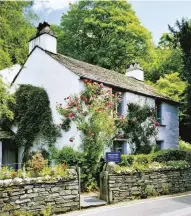  ??  ?? ABOVE Wordsworth lived in Dove Cottage in Grasmere from 1799 to 1808, when it became too small for his growing family LEFT A glorious view of Grasmere from bluebell-strewn Loughrigg Terrace