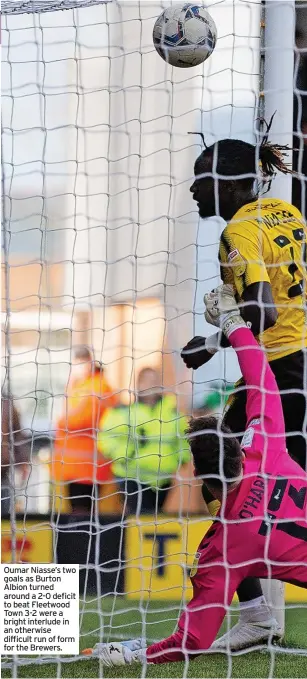  ?? ?? Oumar Niasse’s two goals as Burton Albion turned around a 2-0 deficit to beat Fleetwood Town 3-2 were a bright interlude in an otherwise difficult run of form for the Brewers.