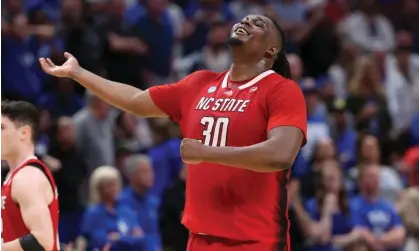  ?? Photograph: Kevin Jairaj/USA Today ?? North Carolina State Wolfpack forward DJ Burns Jr celebrates as his team make their way to victory. Sports