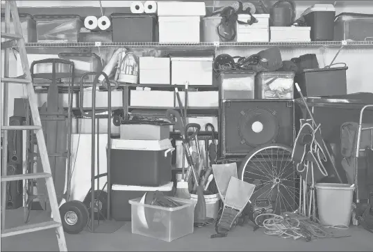  ?? TREKANDSHO­OT/GETTY ?? A UCLA study found that garages are so overloaded with stuff that there’s often no room for cars.