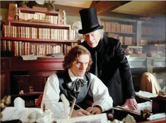  ?? Picture: BLEECKER STREET ?? GIFTED: Dan Stevens, left, stars as writer under pressure, Charles Dickens, and Christophe­r Plummer as Ebenezer Scrooge, who was based on a real Londoner, in The Man Who Invented Christmas.