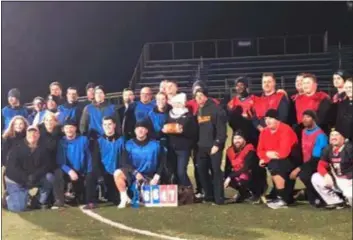  ?? SUBMITTED PHOTO ?? Aston, Upper Chichester and Lower Chichester police edge Crozer EMS, and the Aston, Chester and Parkside fire department­s in the first Aplastic Anemia Awareness Emergency Services Flag Football game, 66-47.