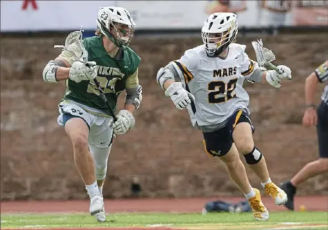  ?? David Garrett/For the Post-Gazette ?? Midfielder Austin Cote, who has committed to play at Loyola (Md.), is one of the team leaders for Mars.