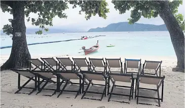  ?? DUSIDA WORRACHADD­EJCHAI ?? Phuket’s Coral Island feels the pinch as borders remain closed.