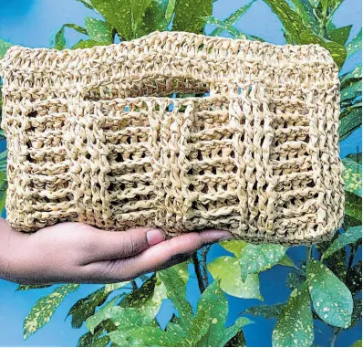  ?? ?? The Basket Weave Clutch