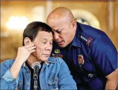  ?? AFP ?? Ronald ‘Bato’ Dela Rosa (right) is seen as the main architect of Philippine President Rodrigo Duterte’s ruthless drug war.