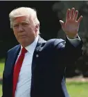  ?? | MARK WILSON/ GETTY IMAGES ?? President Donald Trump walks to Marine One on Friday to start his summer vacation.