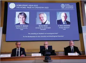  ?? PHOTO BY CHRISTINE OLSSON/TT NEWS AGENCY ?? Secretary General of the Royal Swedish Academy of Sciences Hans Ellegren, centre, Jonas Aqvist, Chairman of the Nobel Committee for Chemistry, left, and Olof Ramstrom, member of the Nobel Committee for Chemistry announce the winners of the 2022 Nobel Prize in Chemistry during a press conference at the Royal Swedish Academy of Sciences in Stockholm, Sweden, Wednesday, Oct. 5, 2022. The winners of the 2022 Nobel Prize in chemistry are Caroline R. Bertozzi of the United States, Morten Meldal of Denmark and K. Barry Sharpless of the United States.