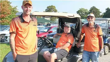  ?? ?? All dressed up in orange for the event are Nick Castle, Steve Macaloney and Len Cole.