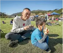  ??  ?? Iwao Fujii and his son, Satoru, of Upper Moutere, attended the Valley to View fair for the first time and are keen to return next year.