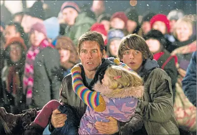  ?? ?? Tom Cruise, Dakota Fanning and Justin Chatwin in 2005 movie of War Of The Worlds