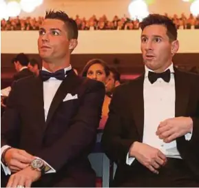  ??  ?? Cristiano Ronaldo (left) and Lionel Messi