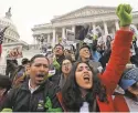  ?? MARK WILSON/GETTY IMAGES ?? Undocument­ed immigrants brought to the country as children protest at the U.S. Capitol on Dec. 6.