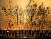  ?? NOAH BERGER/AP ?? In earlier fires, Paradise, Calif., escaped major damage. In the current blazes, it was virtually destroyed.