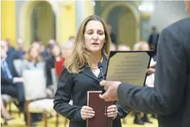  ?? SEAN KILPATRICK/AP ?? Chrystia Freeland is sworn in as Minister of Foreign Affairs during a ceremony at Rideau Hall in Ottawa on Tuesday.