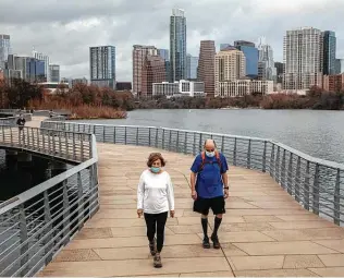  ?? Tamir Kalifa / Getty Images ?? A hike and bike trail is among the features of Austin. The city has bumped Los Angeles from the top commercial growth spot in the country because of Austin’s resilient labor market.