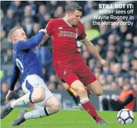  ??  ?? STILL GOT IT: Milner sees off Wayne Rooney in the Mersey derby