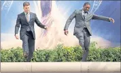  ?? CHRIS PIZZELLO — INVISION/AP ?? Colin Jost, left, and Michael Che, co-hosts for the 70th Primetime Emmy Awards, roll out the gold carpet outside the Microsoft Theatre in Los Angeles on Thursday. The awards ceremony will be held Monday.