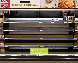  ?? ?? Bare: Empty supermarke­t shelves as supply issues persist