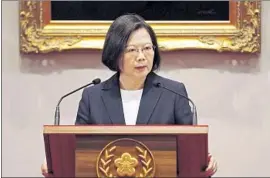  ?? Photograph­s by David Chang EPA/Shuttersto­ck ?? TAIWANESE President Tsai Ing-wen announces the severance of ties by the Solomon Islands. The South Pacific nation is the latest to align itself with China.