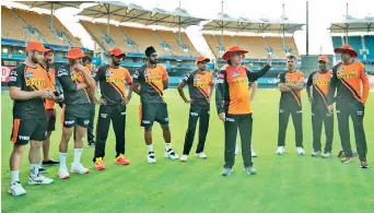  ?? — SRH ?? Sunrisers Hyderabad players are all ears as coach Trevor Bayliss speaks during a training session.