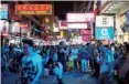  ?? PHOTOS BY ROY LIU / CHINA DAILY ?? Fans gave Sai Yeung Choi Street South pedestrian-only zone a grand send-off last weekend, before it was reopened to vehicular traffic.