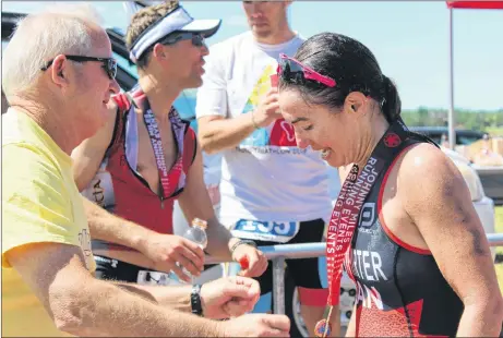  ?? AMANDA JESS/THE NEWS ?? Micheline McWhirter of Halifax was the first female to cross the finish line in the Olympic distance at the Melmerby Triathlon on Sunday.