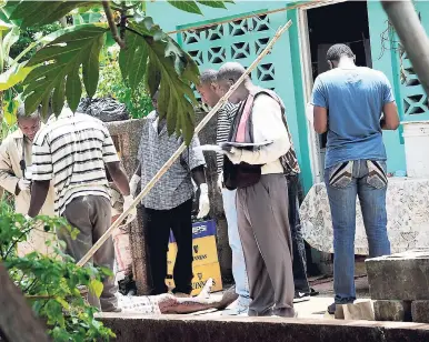  ??  ?? In this file photo, the police are processing a crime scene in St Mary.