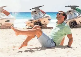  ?? PHOTOS PROVIDED BY CATE CAMERON/LIONSGATE ?? Dornan frolics in the sun as Edgar in "Barb & Star Go to Vista Del Mar."