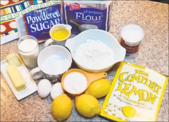  ?? Stephen Fries / For Hearst Connecticu­t Media ?? Ingredient­s for lemon loaf recipe.