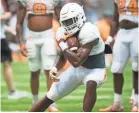  ??  ?? Tennessee running back Ty Chandler (3) is one of seven sophomores who appear poised to be starters for UT's offense. CAITIE MCMEKIN/NEWS SENTINEL,