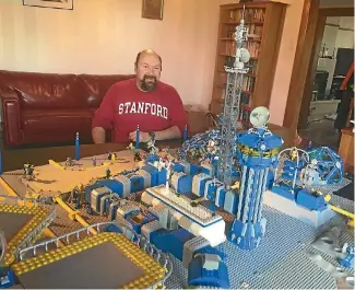  ?? PHOTO: MAHVASH ALI/STUFF ?? Auckland man Colin Doyle took two years to create this Lego moon base.