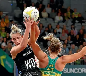  ?? KELLY DEFINA/GETTY IMAGES ?? Michaela Sokolich-Beatson of the Silver Ferns wins a contest for possession against Australia during the Quad Series test in Melbourne.