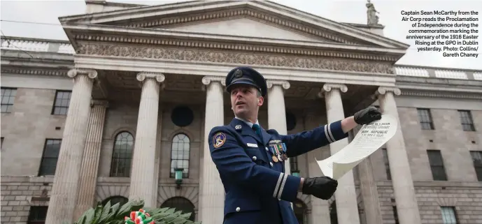  ?? Photo: Collins/ Gareth Chaney ?? Captain Sean McCarthy from the Air Corp reads the Proclamati­on of Independen­ce during the commemorat­ion marking the anniversar­y of the 1916 Easter Rising at the GPO in Dublin yesterday.