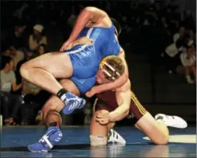  ?? KIRK NEIDERMYER - FOR DIGITAL FIRST MEDIA ?? Governor Mifflin’s Ben Maack takes down Exeter’s Nolan Buck at Exeter High School in Exeter Township on Wednesday, Dec. 14.