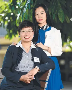  ?? INFLUENCE: Overseas project manager at HYL Logistics Co Ltd Crystal Pugh, with PhD candidate Jing Li. Picture: ALIX SWEENEY ??