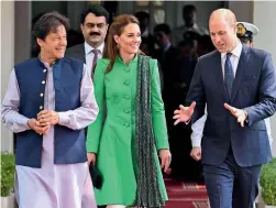  ??  ?? WARM WELCOME: William and Kate with Imran Khan in Islamabad on Tuesday. — Reuters