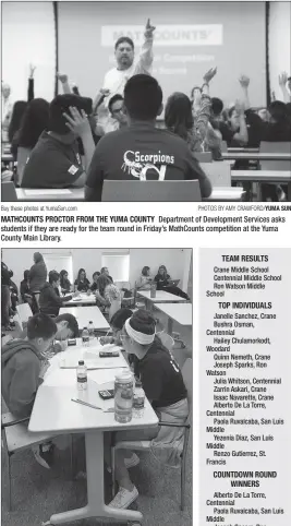  ?? Buy these photos at YumaSun.com PHOTOS BY AMY CRAWFORD/YUMA SUN ?? MATHCOUNTS PROCTOR FROM THE YUMA COUNTY Department of Developmen­t Services asks students if they are ready for the team round in Friday’s MathCounts competitio­n at the Yuma County Main Library.