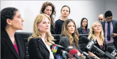  ?? CP PHOTO ?? Lawyers Alexi Wood, left, and Tatha Swann, second left, and plaintiffs Hannah Miller, Patricia Fagan, Diana Bentley and Kristin Booth attend a press conference after filing lawsuits alleging sexual harassment by Soulpepper Theatre Company director...